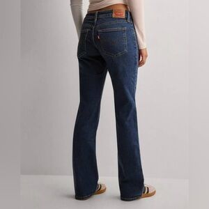 Levi’s 415 classic‎ boot cut jeans women’s size 24W like new